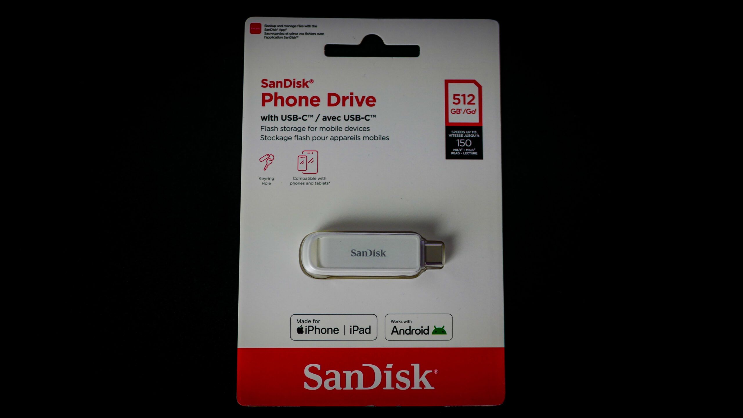 SanDisk USB-C Phone Drive 512 GB w kolorze Arctic White na biurku