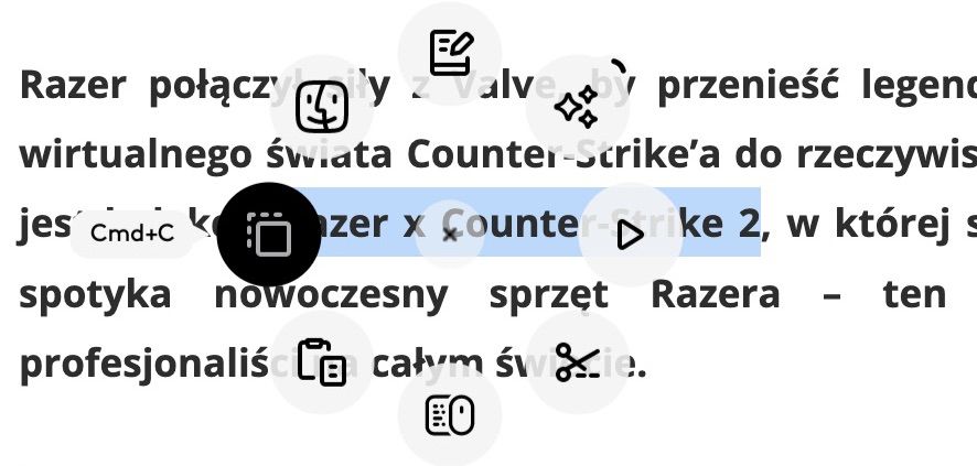 Menu kołowe Actions Ring z opcjami 'Wytnij' i 'Kopiuj' wyświetlone na tekście w aplikacji